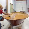 Applying second coat of build up varnish